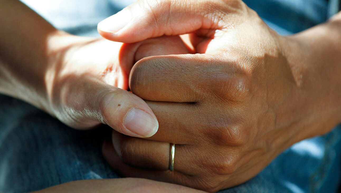 Two different hands interlinked