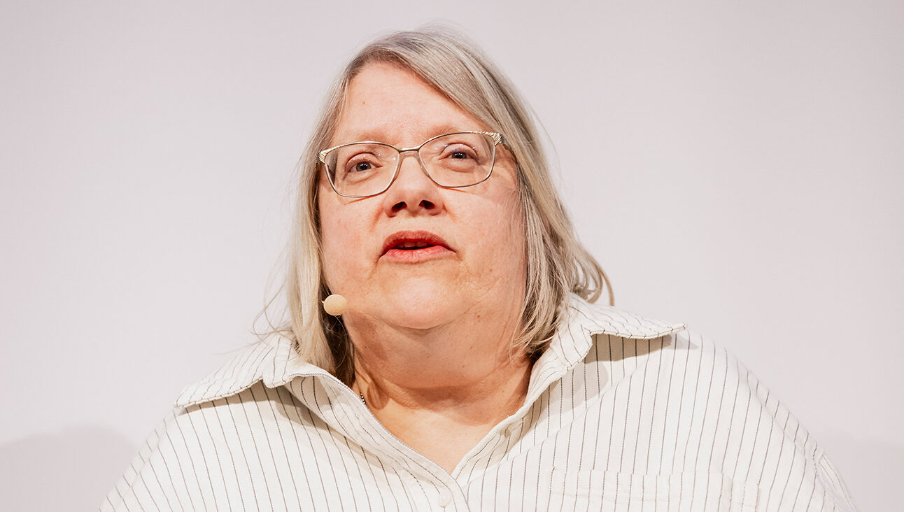 A close up of Jano Goodhcild speaking at the NICE Conference 2026