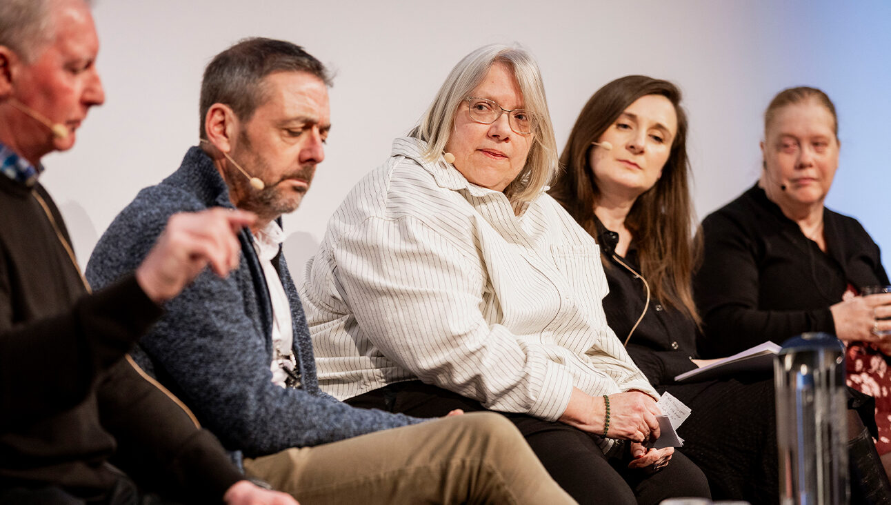 Jano Goodchild on stage at the NICE conference 2026 with the other speakers