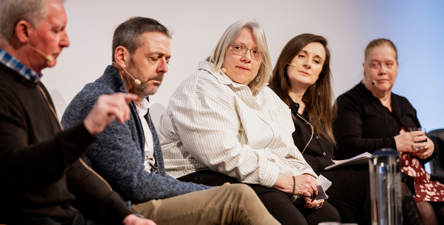 Jano Goodchild on stage at the NICE conference 2026 with the other speakers