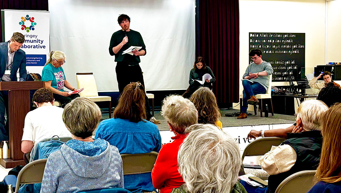 Ruairidh Paton, candidate for the Green Party, answers a question at the Haringey communcity hustings event