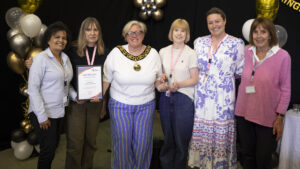 Loneliness Awareness Week 2026 Award Winners Café Palais at Alexandra Palace pictured with the Mayor of Haringey
