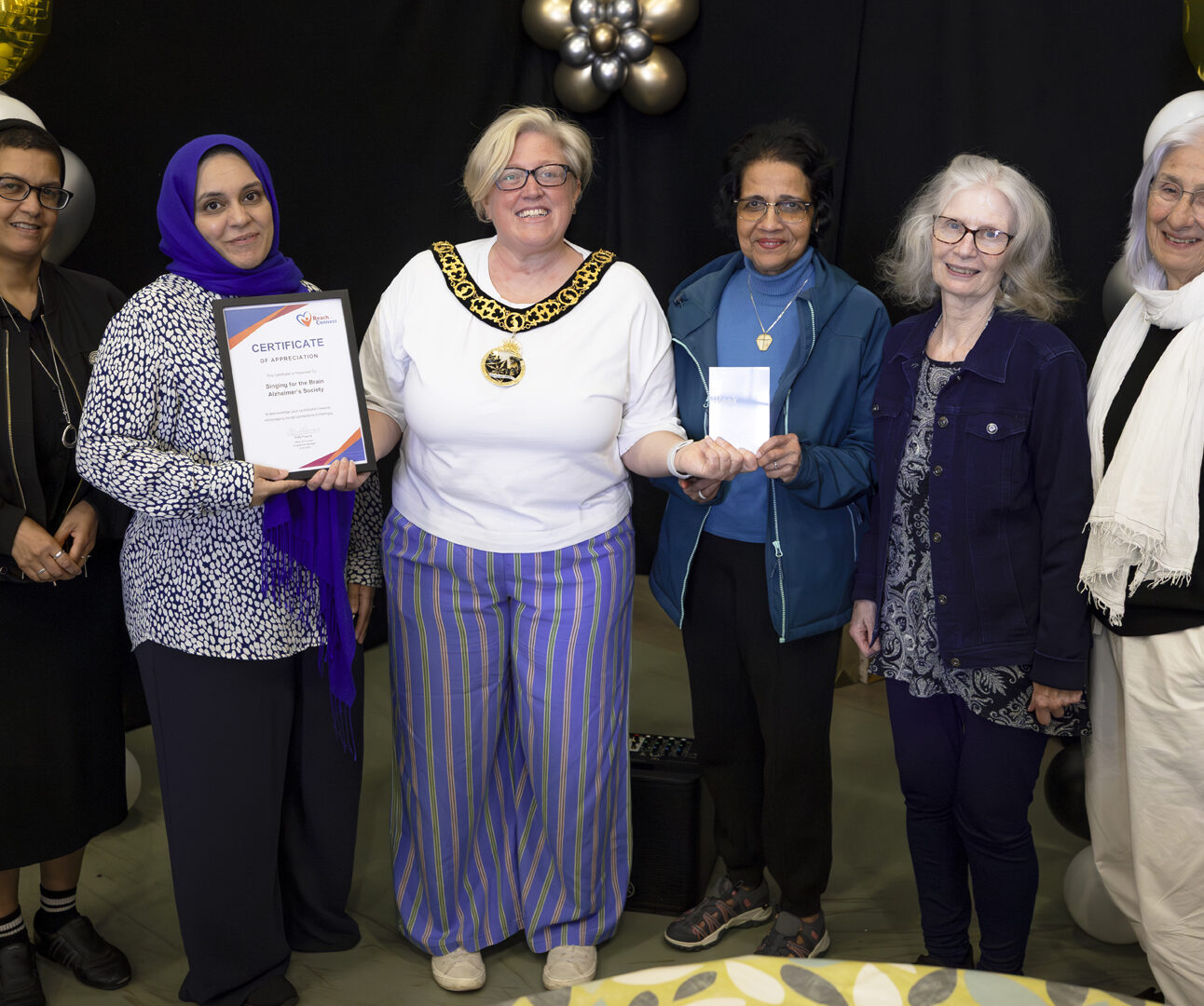 Loneliness Awareness Week 2026 Award Winners Singing for The Brain pictured with the Mayor of Haringey